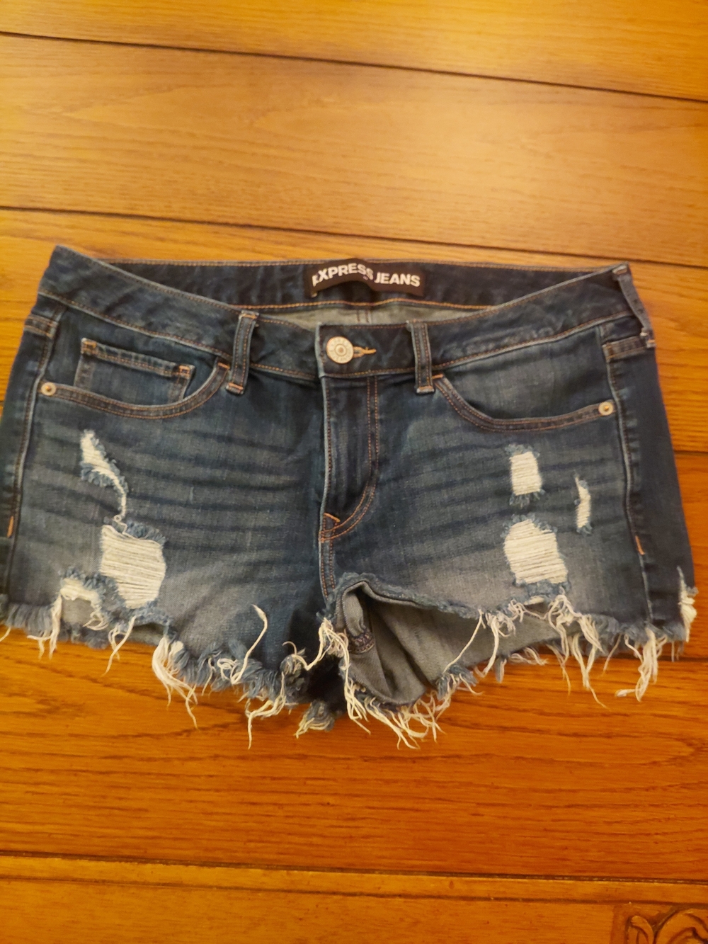 Women’s Distressed Denim Shorts in Dark Blue